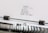 A close-up of a typewriter with a sheet of paper in it. The paper contains the word 'thank you' typed in multiple languages, including German, English, French, Italian, Spanish, and Dutch.