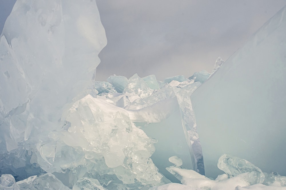 white ice blocks on water