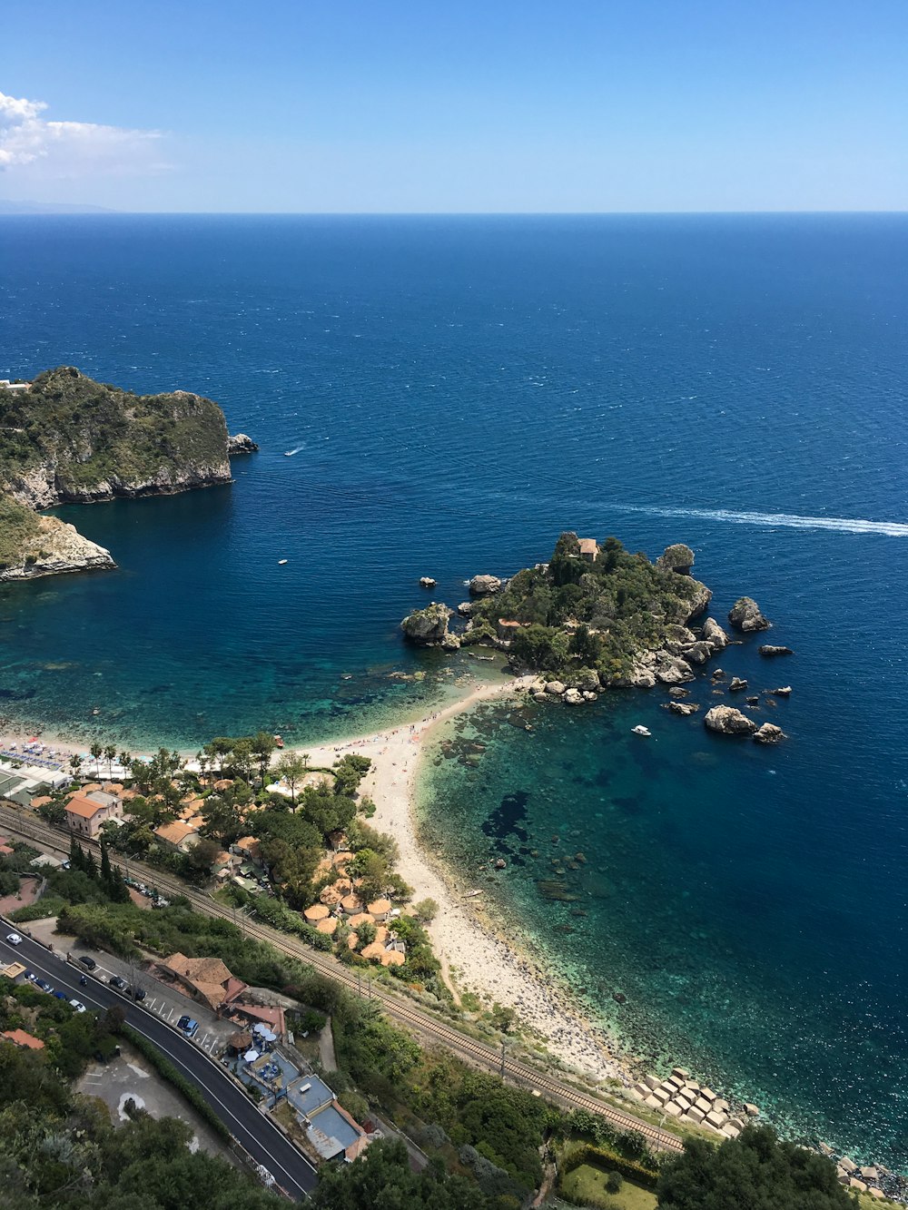 aerial view of green and brown island during daytime