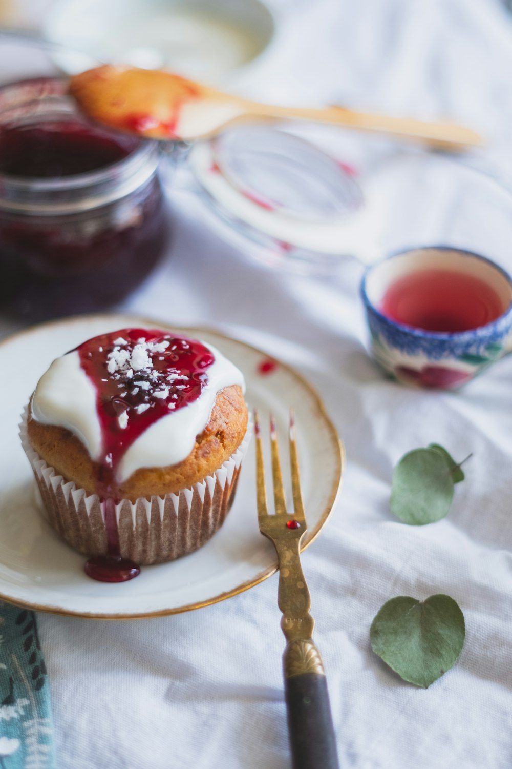 chocolate cupcake with white icing on top