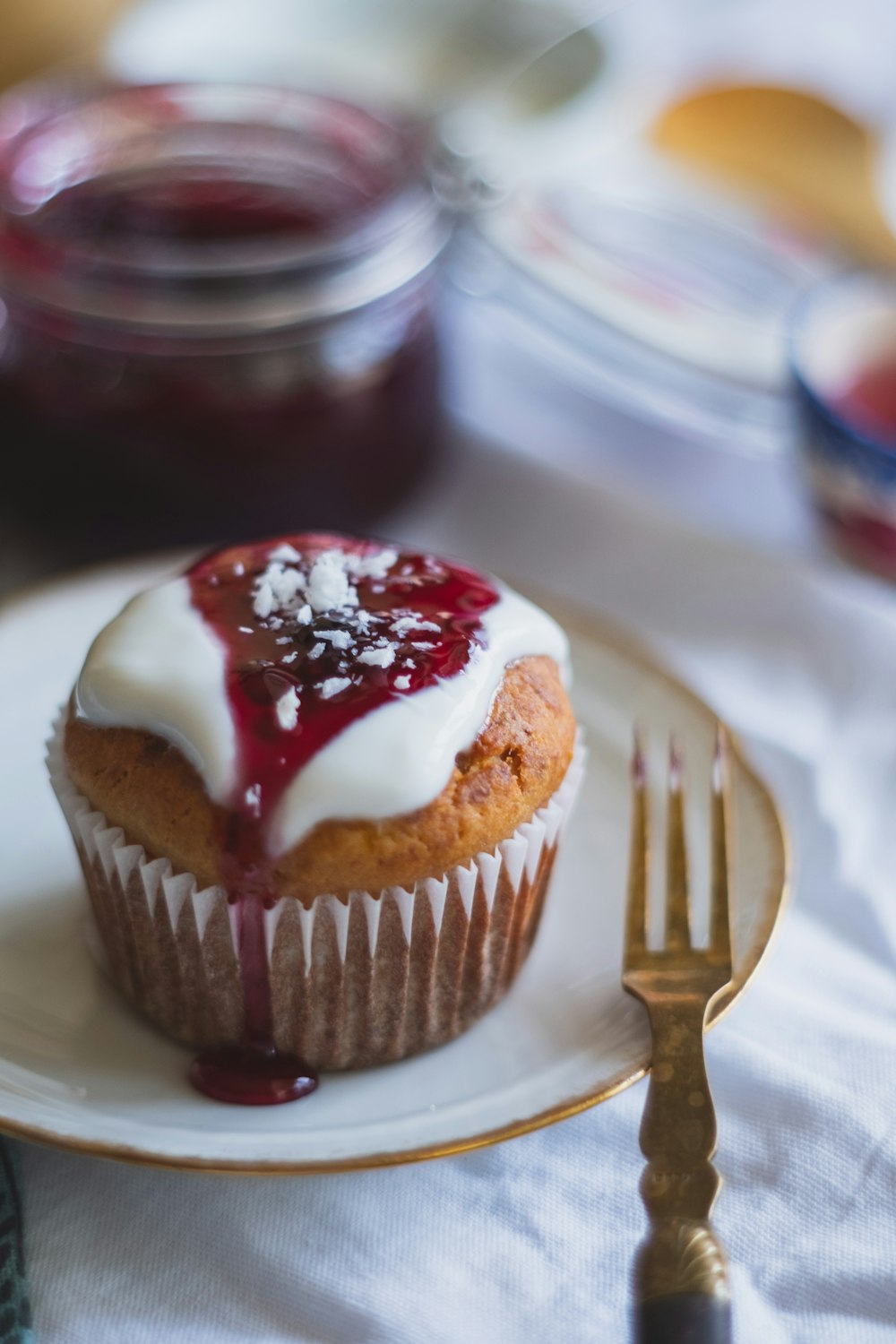 chocolate cupcake with white icing on top