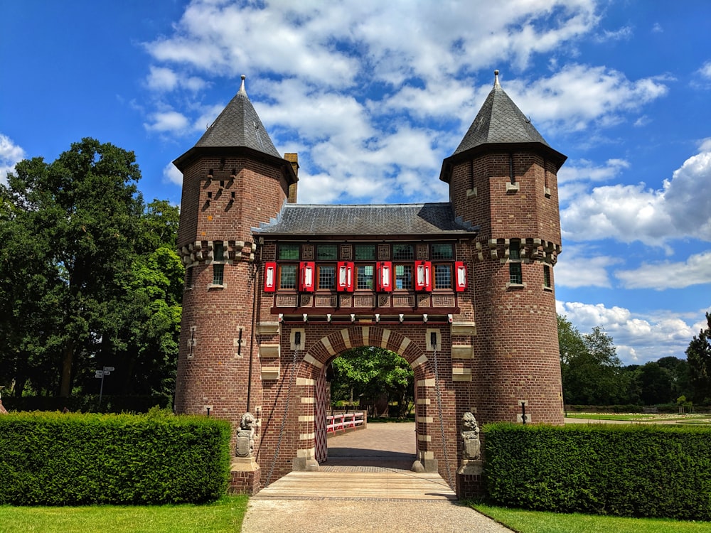 brown brick building under blue sky