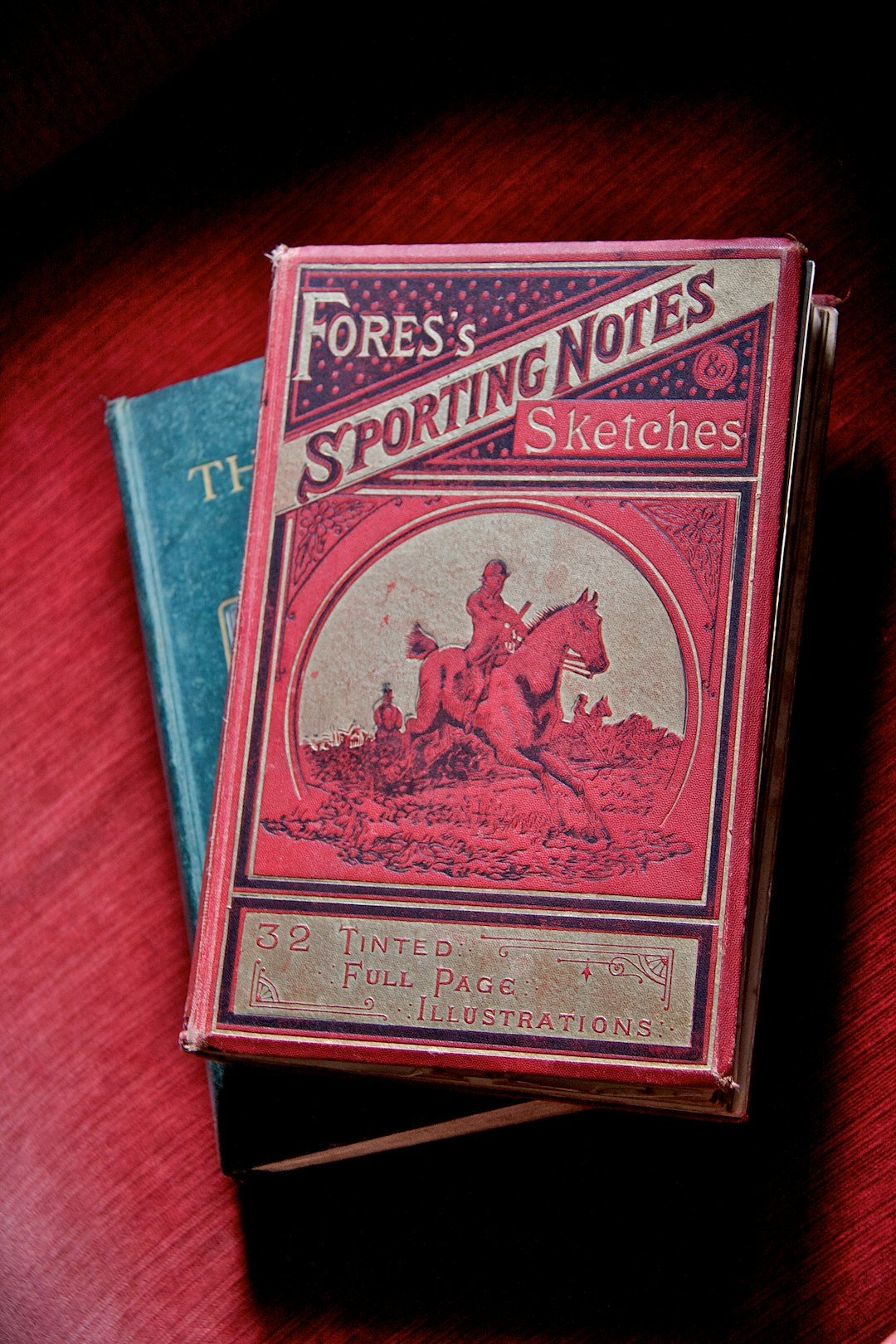 bicycle playing cards box on red textile