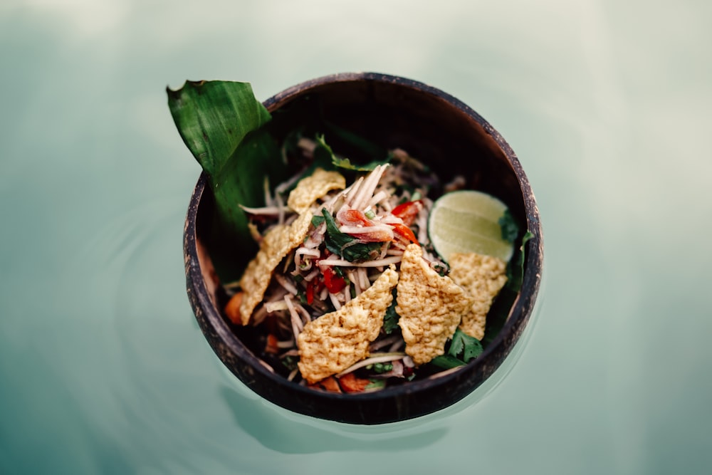 cooked food in black bowl