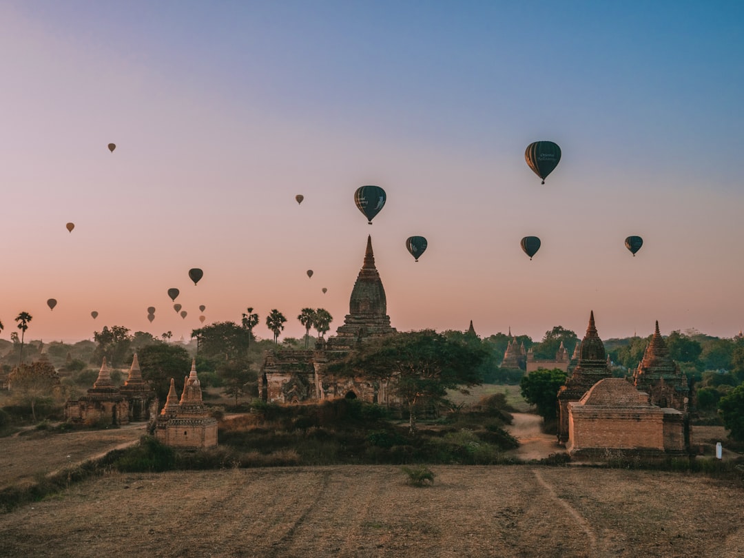 hot air balloons in the sky during sunset