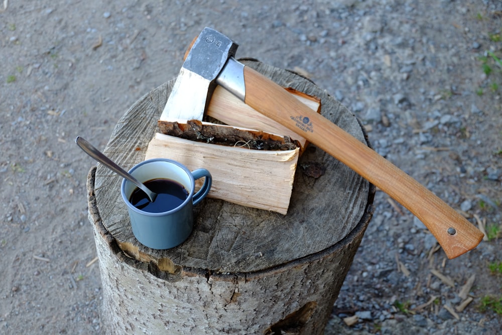 blue ceramic mug with brown handle