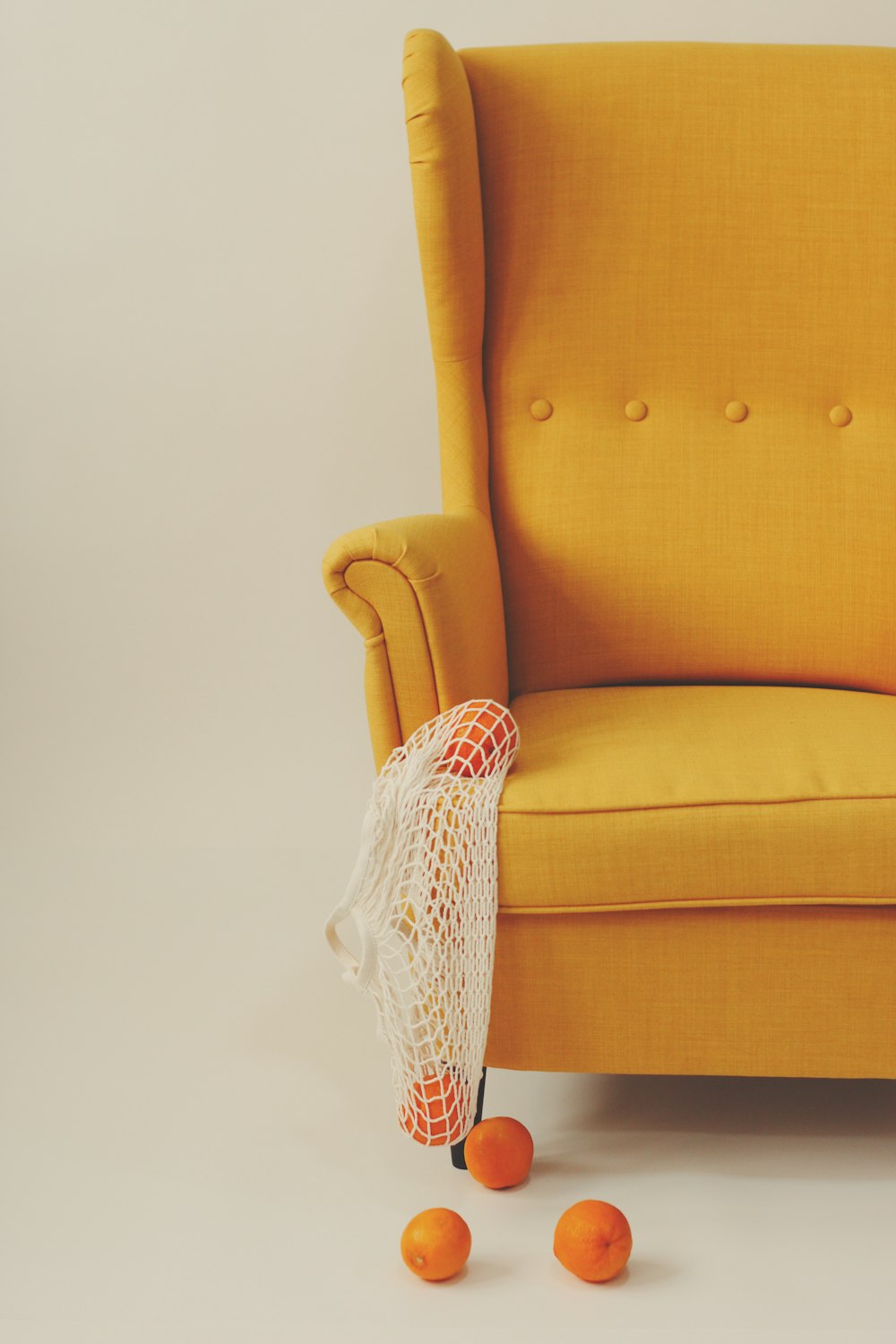 yellow and white sofa chair