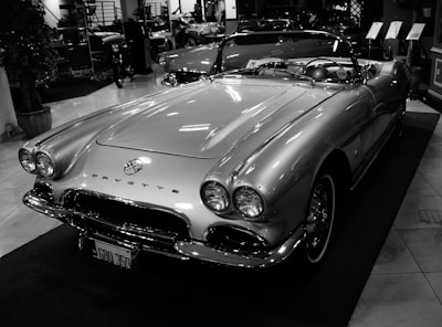 grayscale photo of mercedes benz convertible coupe
