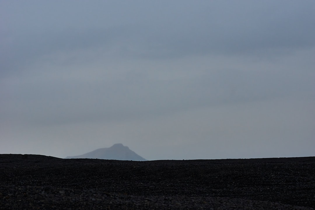 black mountain under white sky during daytime