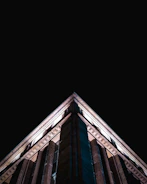 3D exterior view of a commercial building highlighting architectural details and lighting effects.