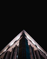 Evening shot of a completed project with elegant lighting emphasizing volumetry.