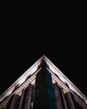 3D exterior view of a commercial building highlighting architectural details and lighting effects.