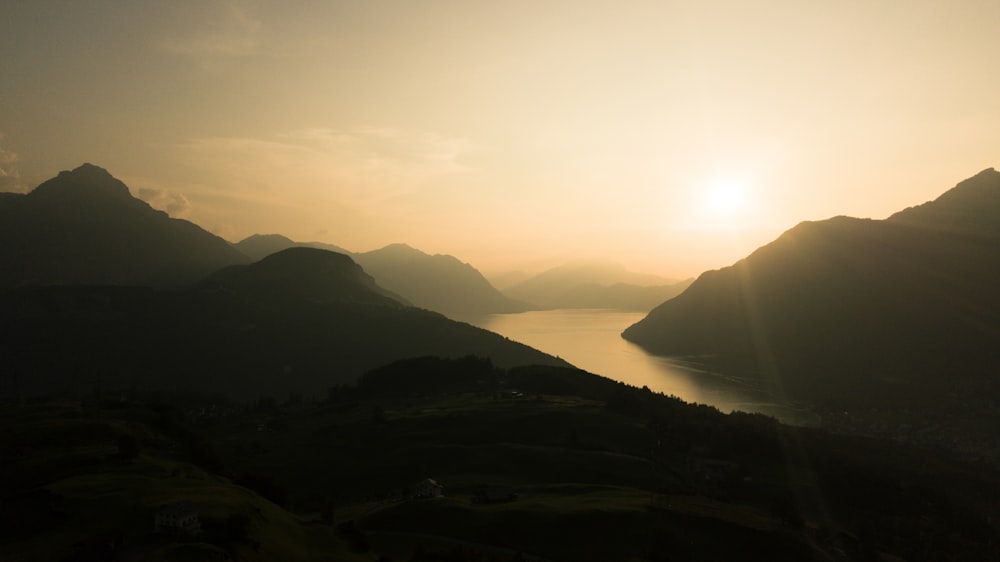 silhouette of mountains during sunset