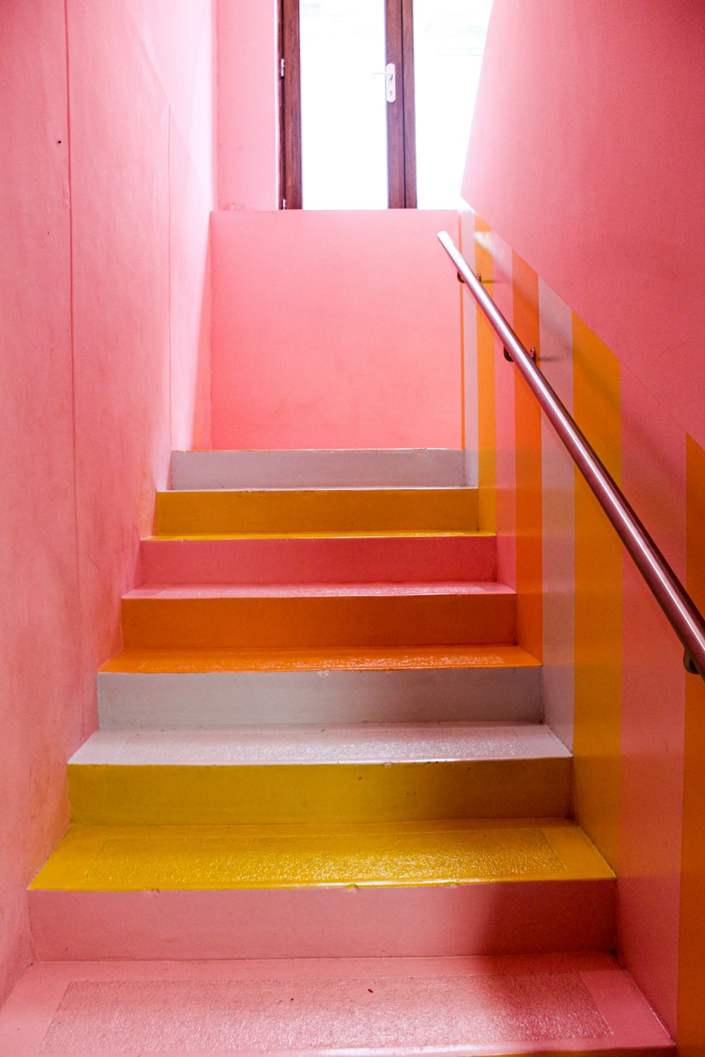 white and brown wooden staircase