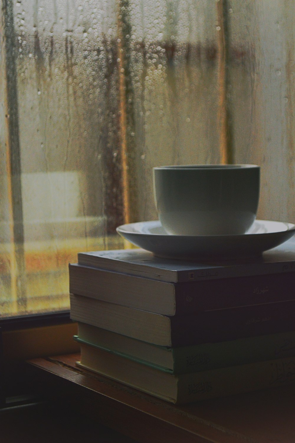 white ceramic bowl on white wooden drawer