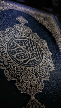 Cover of a detailed Islamic education book with elegant script.