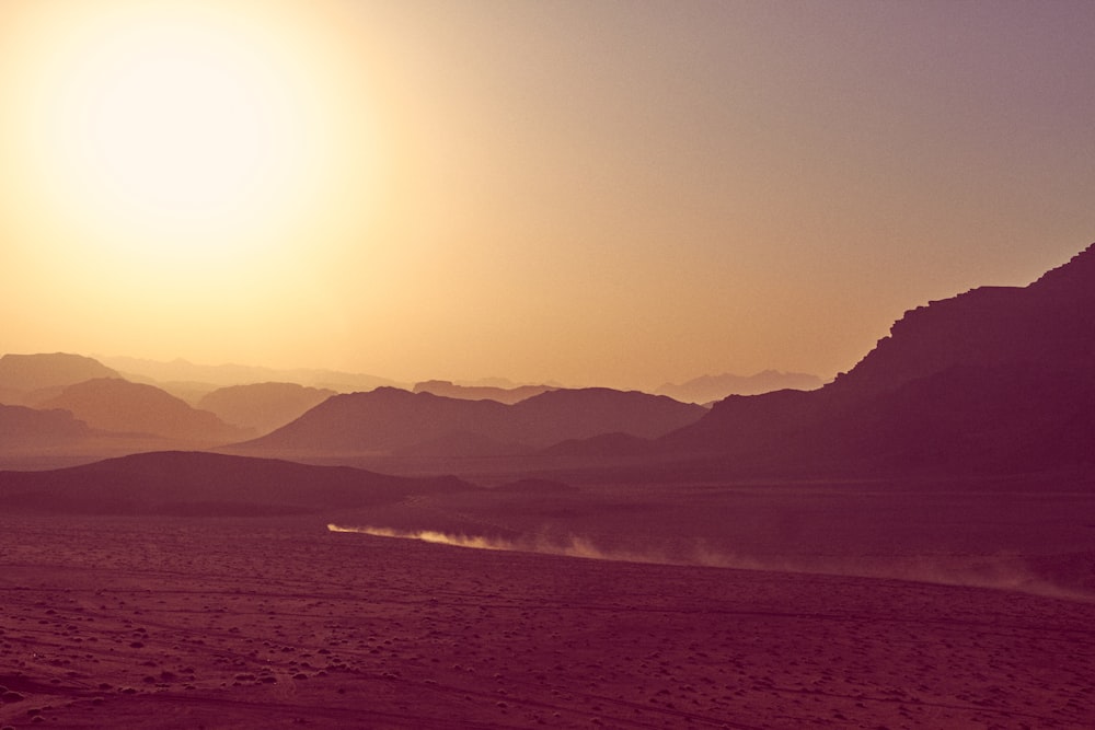 silhouette of mountains during sunset