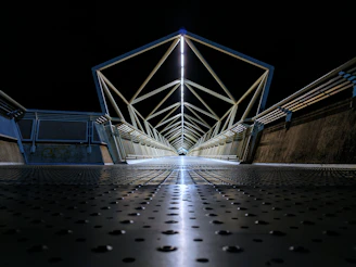 gray metal frame building during night time