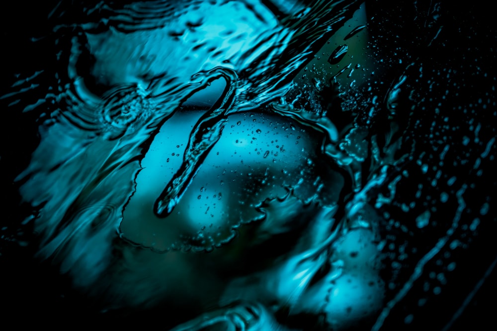 water drops on blue surface