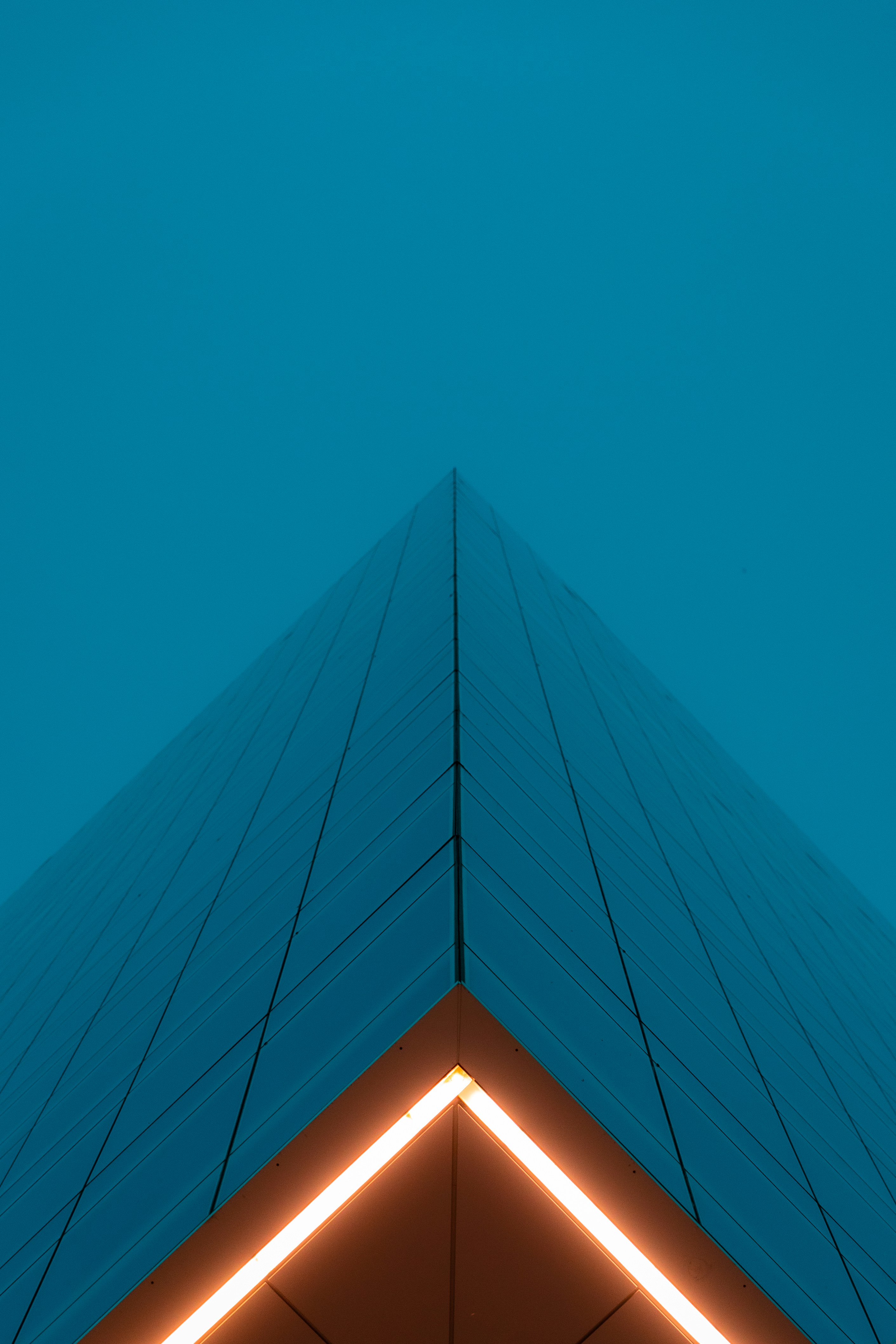 blue and orange building under blue sky