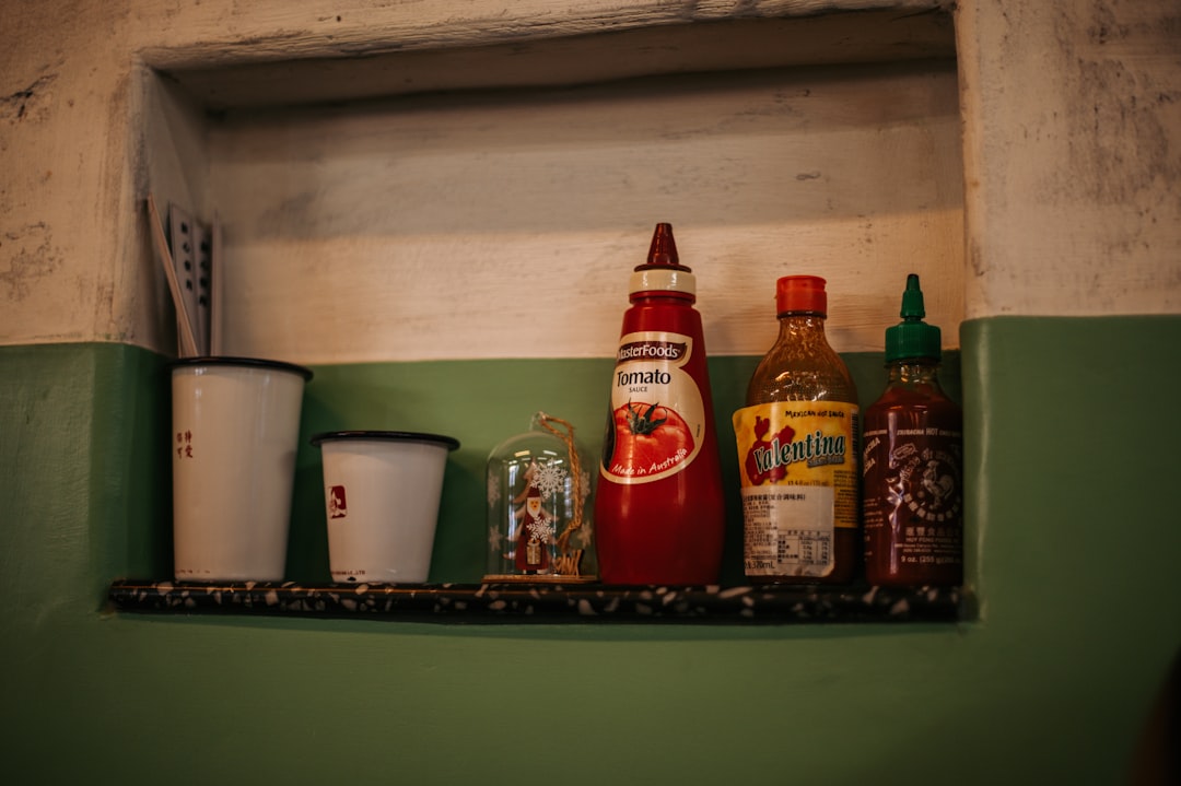 two red and yellow plastic bottles