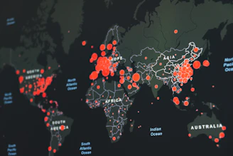 world map showing red infection clusters