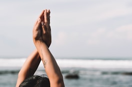 A close-up of hands in prayer, representing faith and devotion.