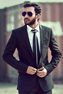 man in black suit jacket