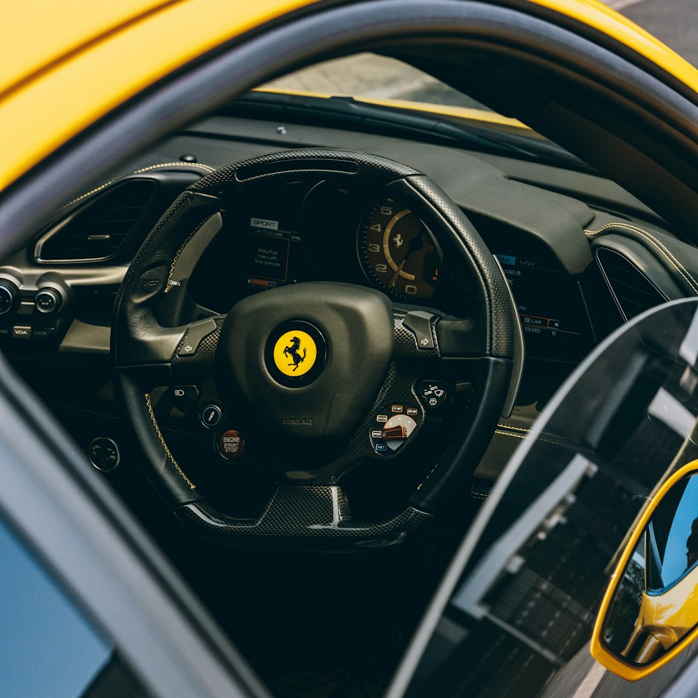 black and yellow steering wheel