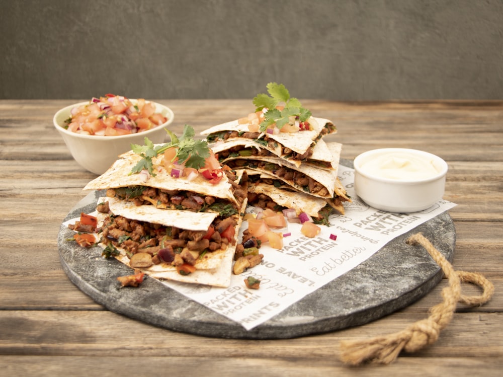 vegetable salad on brown wooden round plate