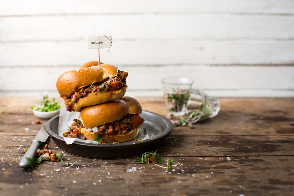 burger on black round plate