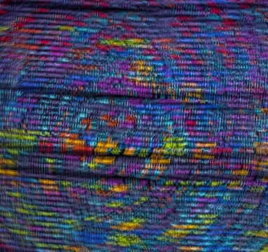 purple green and yellow textile