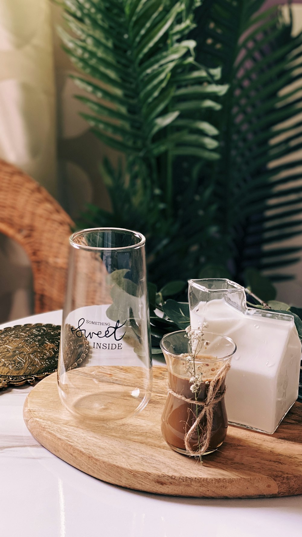 clear drinking glass on brown wooden table