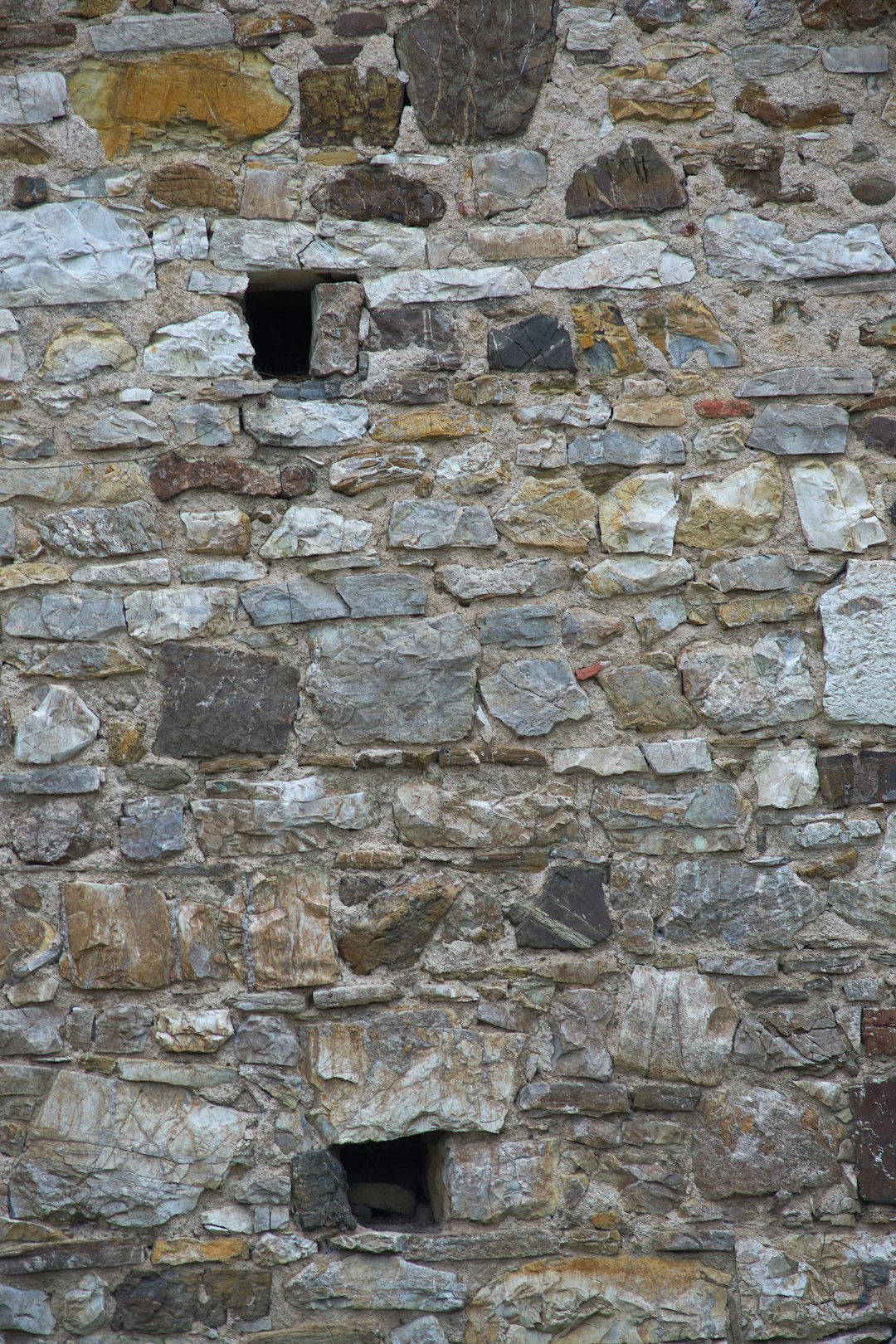 brown and gray brick wall