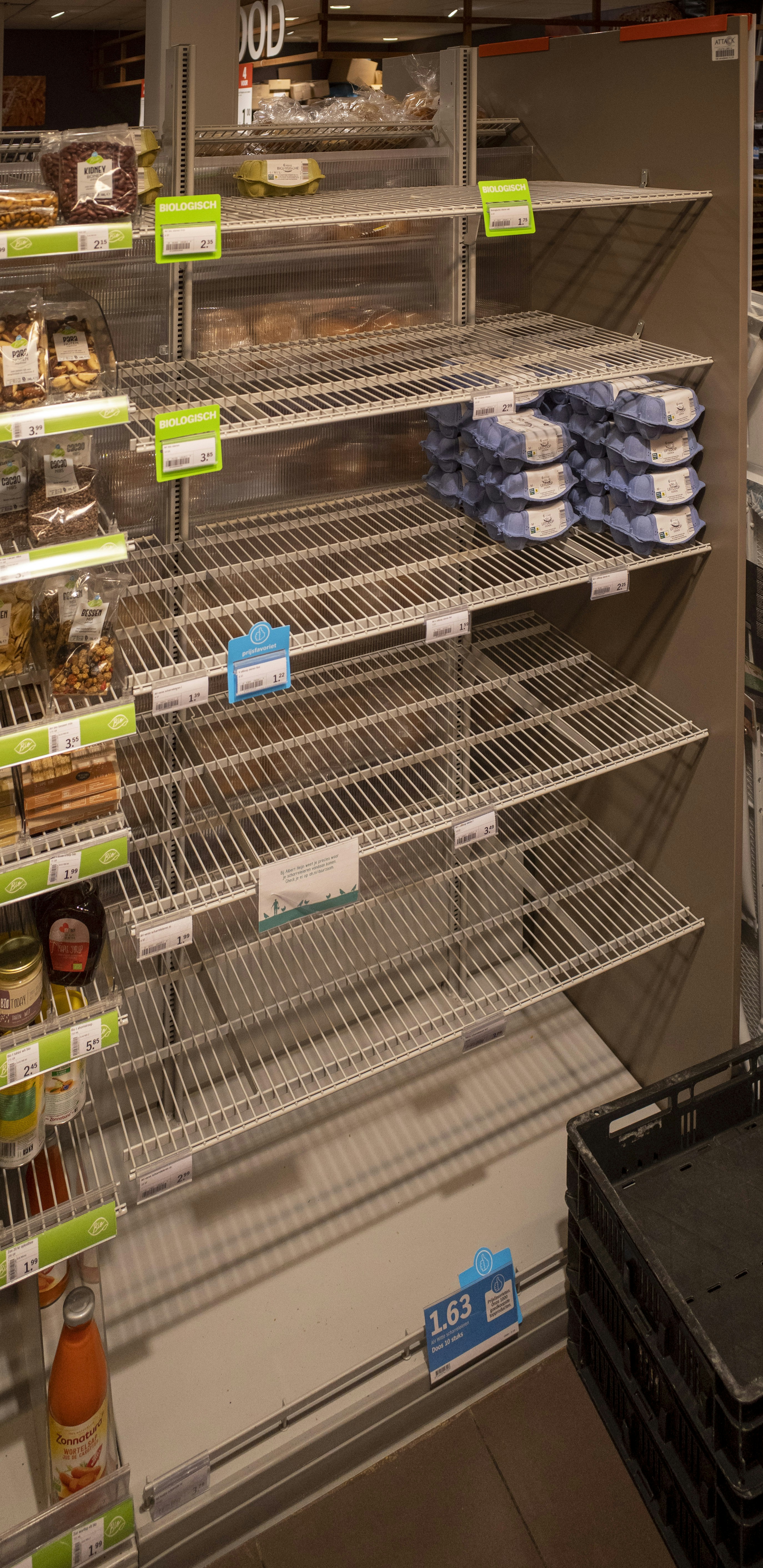white plastic cups on white steel rack