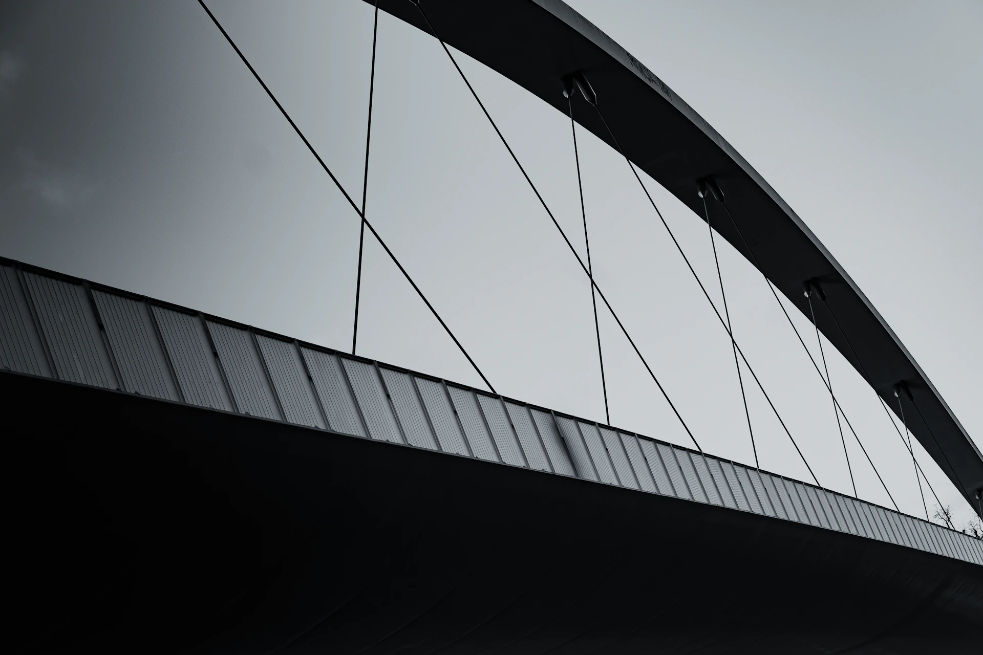 black and white bridge under white sky