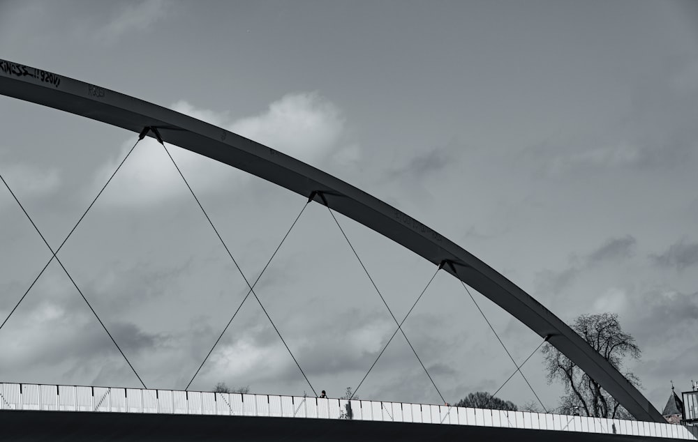 white metal bridge under blue sky