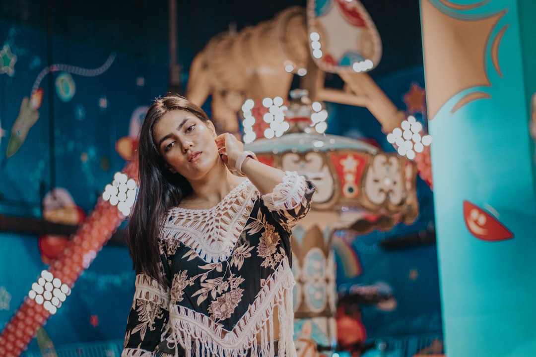 woman in white and black tribal long sleeve shirt