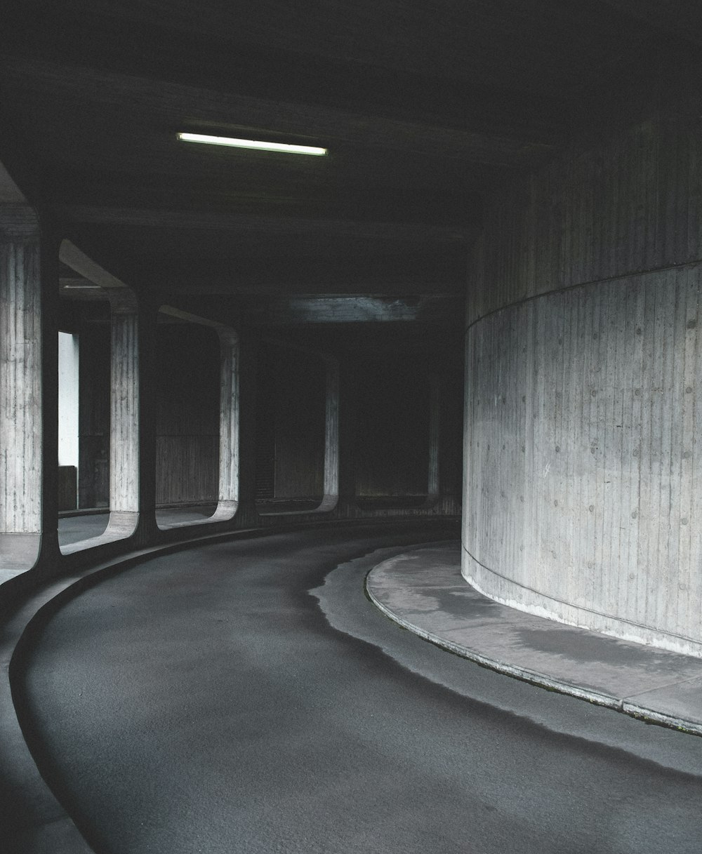 empty tunnel with lights turned on during daytime