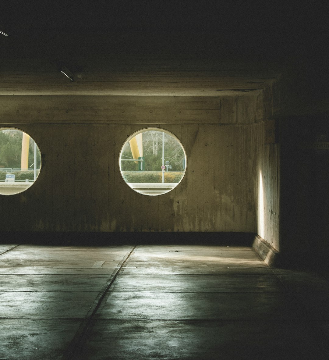 brown wooden tunnel with glass windows