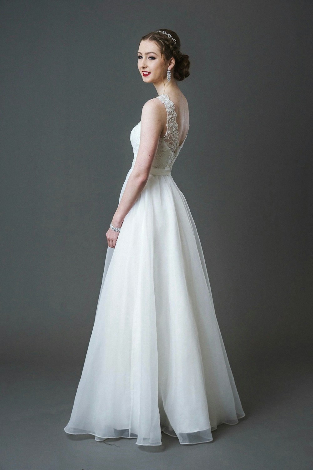 woman in white floral lace dress