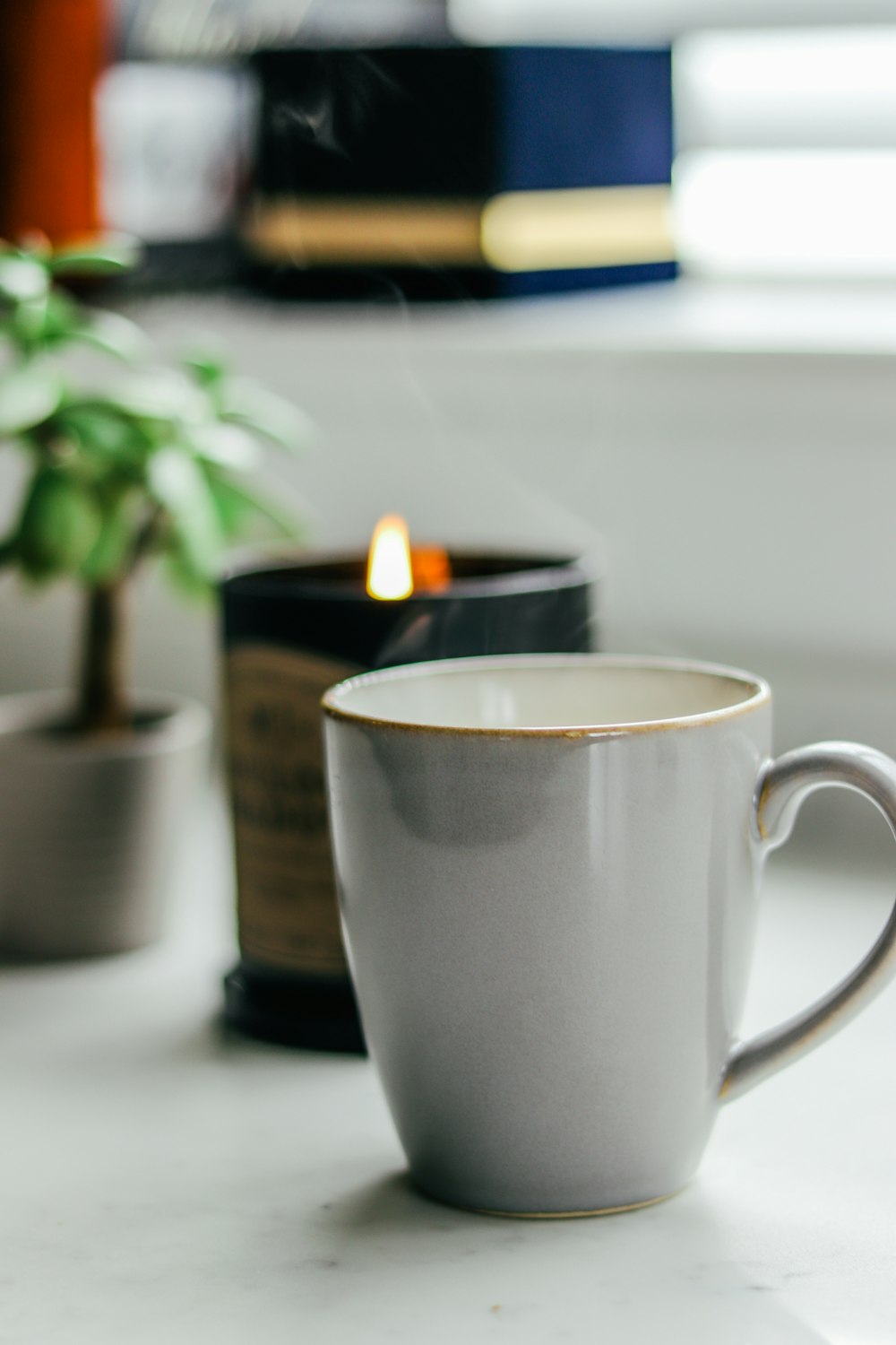 white ceramic mug on table