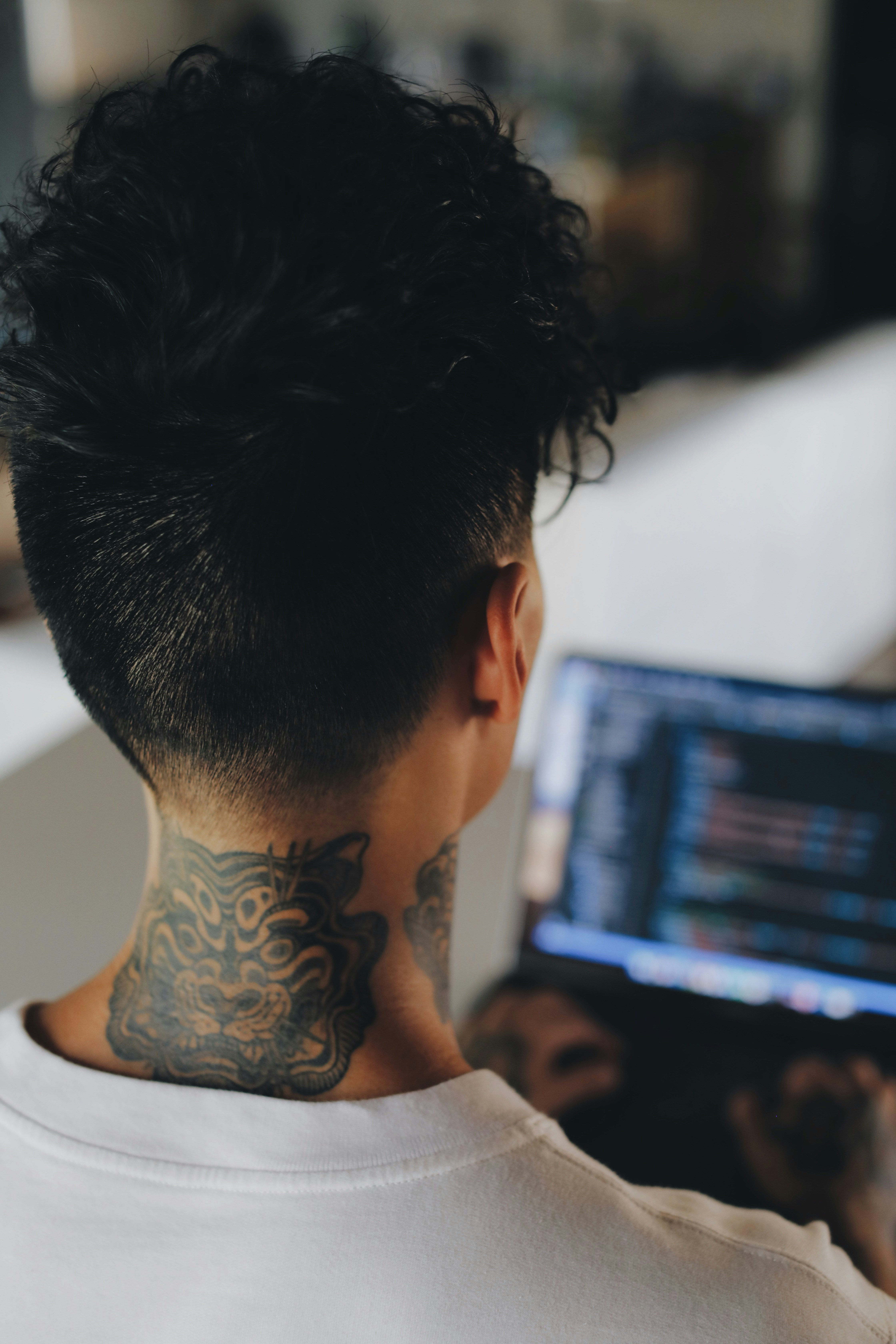 Person With Red And Black Skull Tattoo Photo Free Grey Image On Unsplash