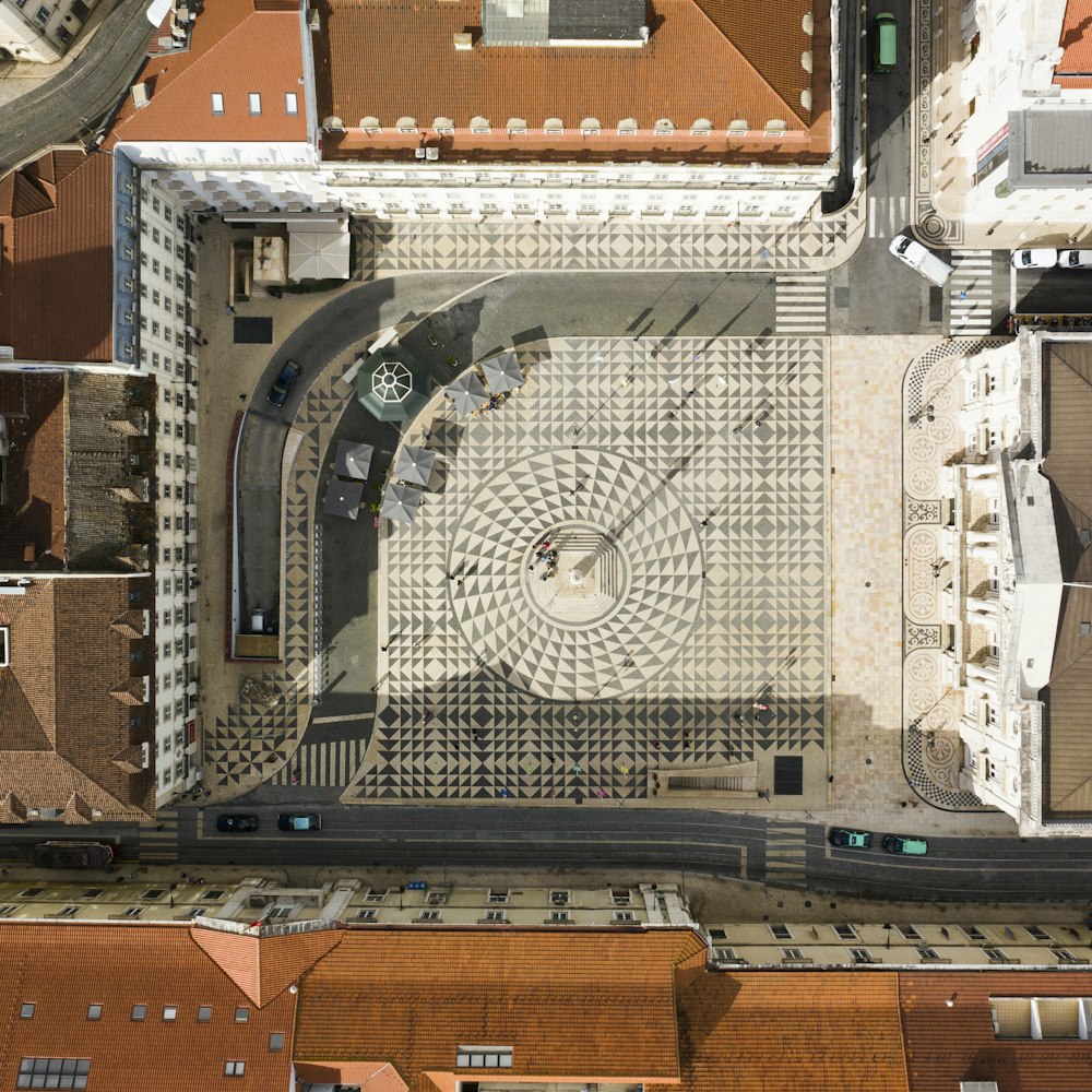 an aerial view of a city with a clock tower