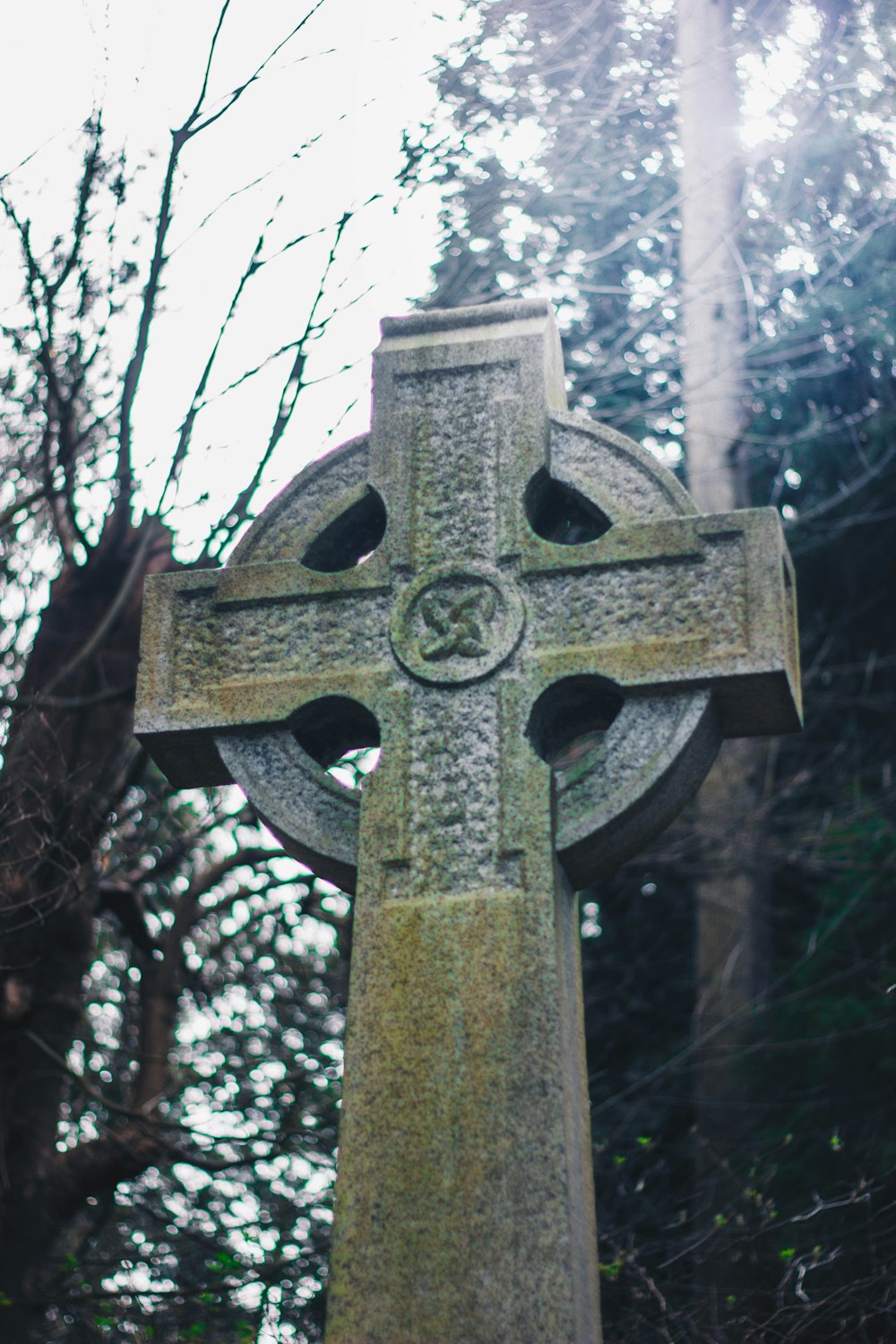 brown cross with cross on top