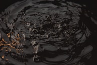 water droplets on body of water