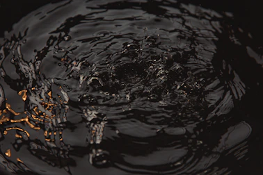 water droplets on body of water