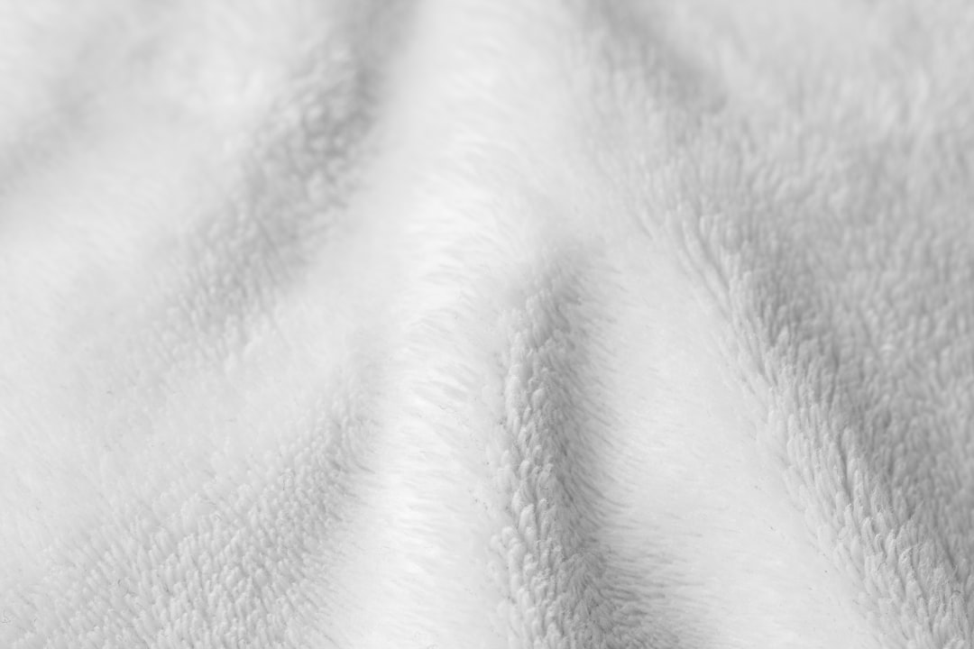  white textile in close up image blanket