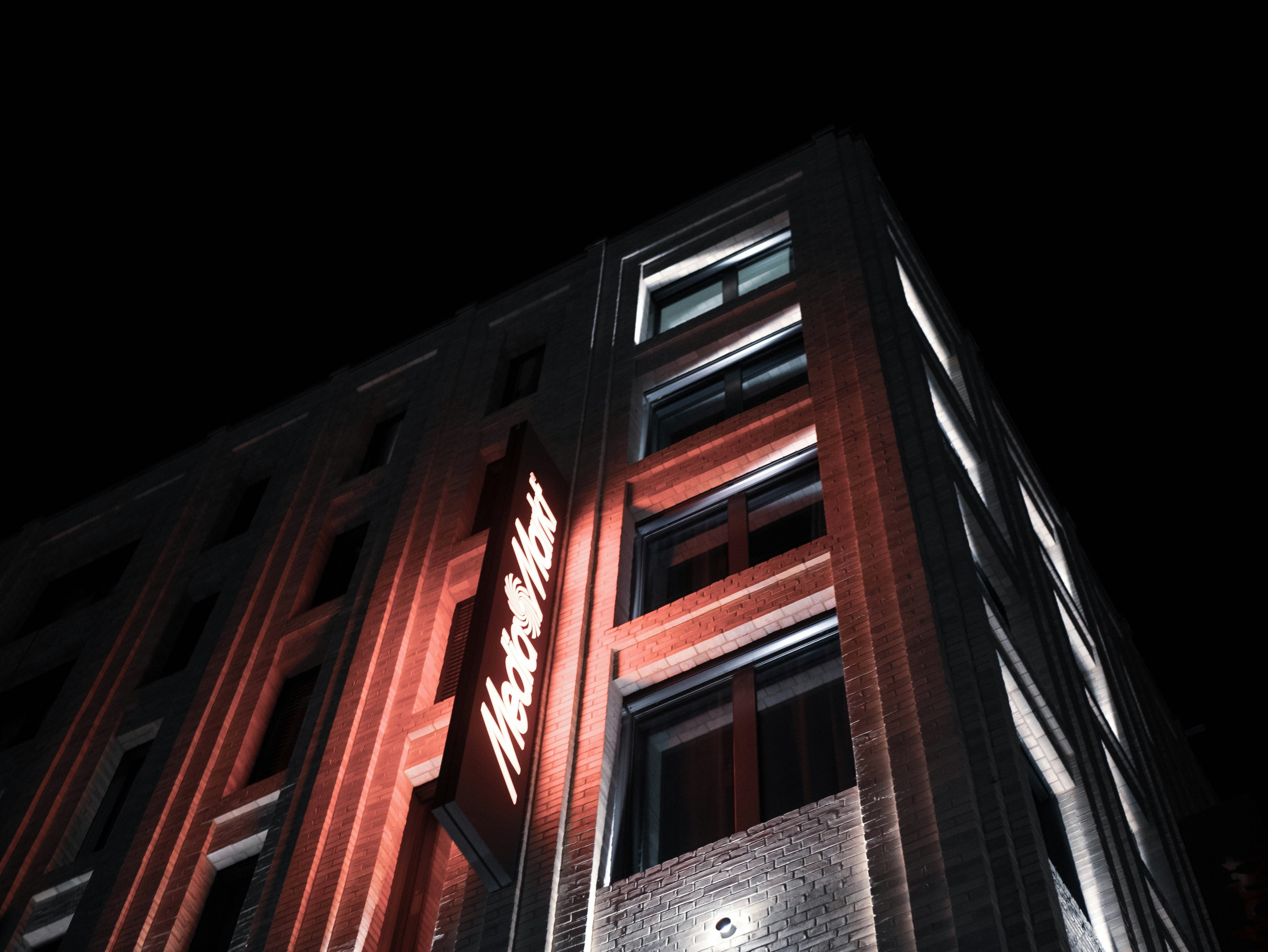 brown concrete building during nighttime
