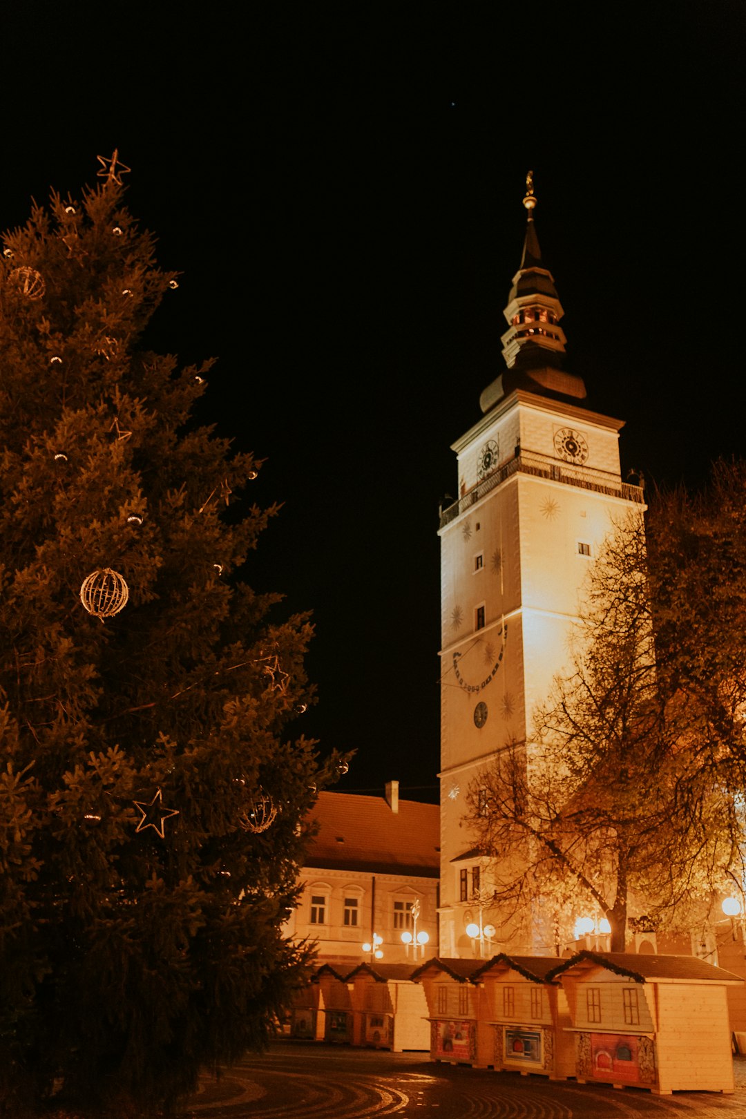 brown concrete building with clock tower